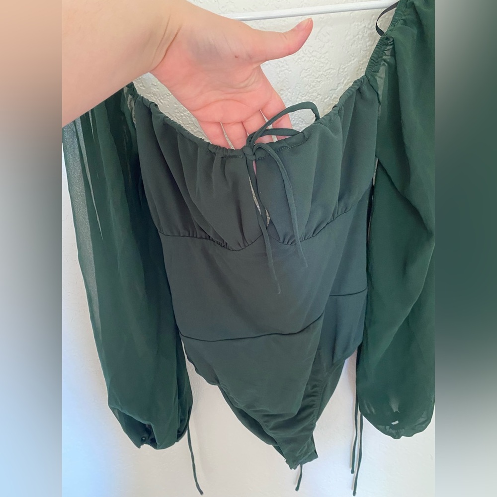 Emerald green open back body suit